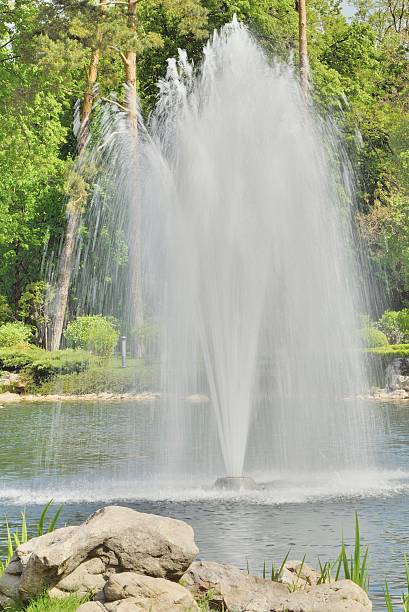 istock Fountain in the lake in the park 475903788