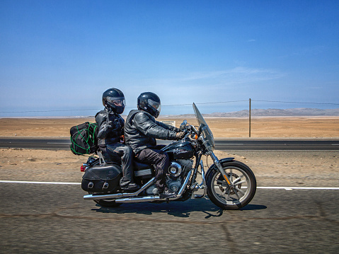 Huaral, Peru - January 22, 2015: Harley Davidson Motorcyclists on the pan-american highway in Peru