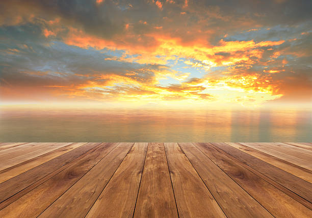 木製フロアーと素晴らしい日の出 - 桟橋　無人 ストックフォトと画像