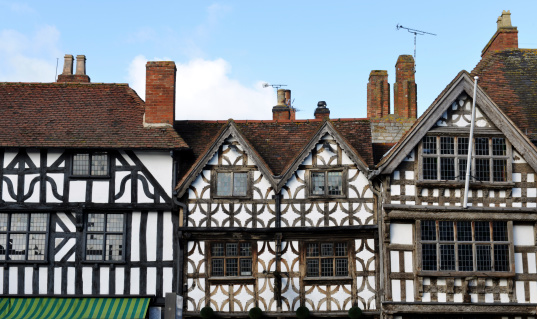 Ancient wooden gables and roofs above shops and street level  in Church street Stratford upon Avon (Shakespeare's home town)