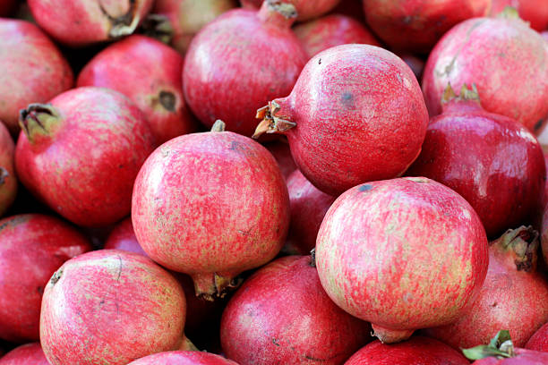 istock Pile of Gorgeous Pomegranate Fruit 475906827