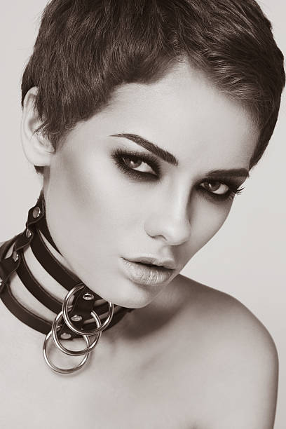 istock Woman in leather collar 475912078