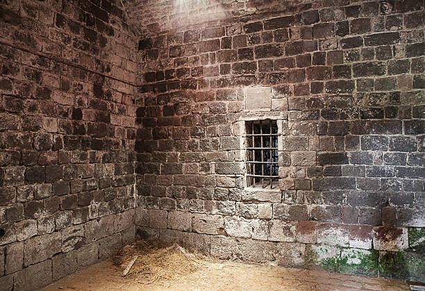 Abandoned prison cell stock photo