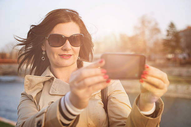 istock Self portrait on a smartphone 475915273