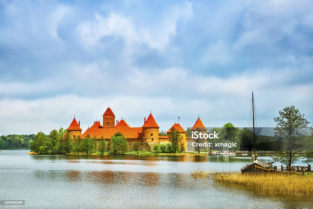 Medieval old castle in Trakai, Lithuania Panoramic view on Medieval old castle in Trakai, Lithuania placed on Galve lake. Ancient Stock Photo