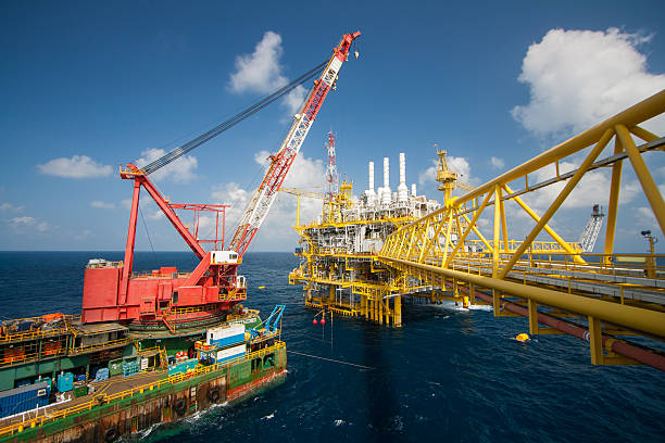 istock Large crane vessel installing the platform in offshore 475915411