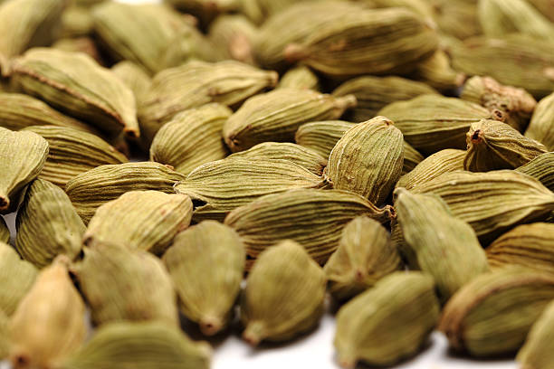 istock Green Cardmom seeds close up macro shots 475915876
