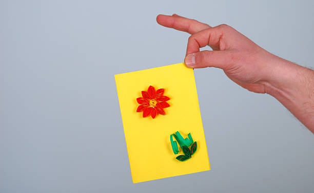 istock Man hand hold love you card 475916946