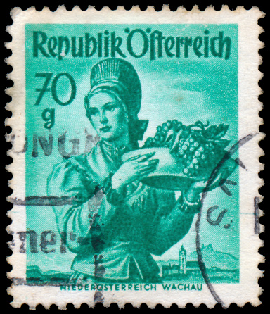 AUSTRIA - CIRCA 1949: A stamp printed in Austria, shows a woman in national dress, Lower Austria, Wachau, circa 1949