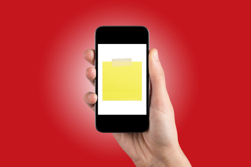 Holding Mobile Smart Phone with Post-it