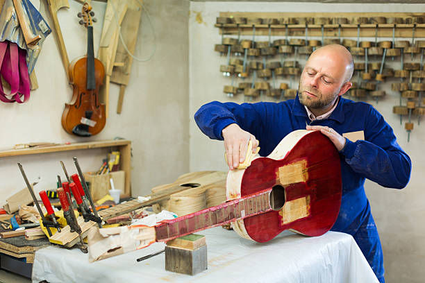 istock Atelier posing with his guitars 475929036