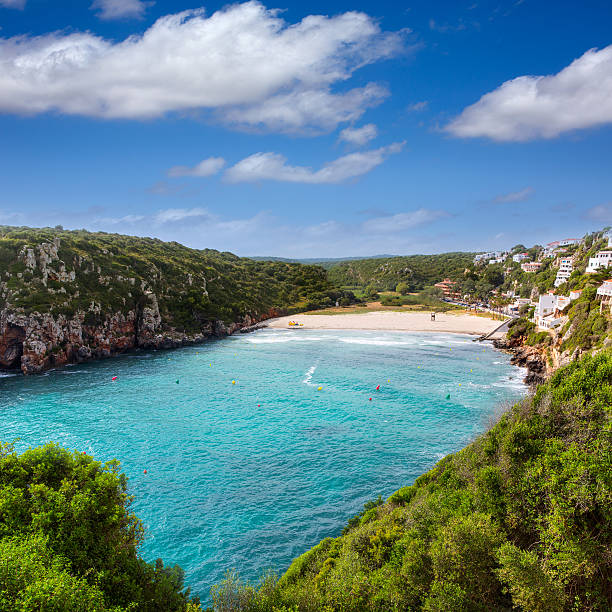 Cala en Porter beautiful beach in menorca at Balearics Cala en Porter beautiful beach in menorca at Balearic islands of spain balearics stock pictures, royalty-free photos & images