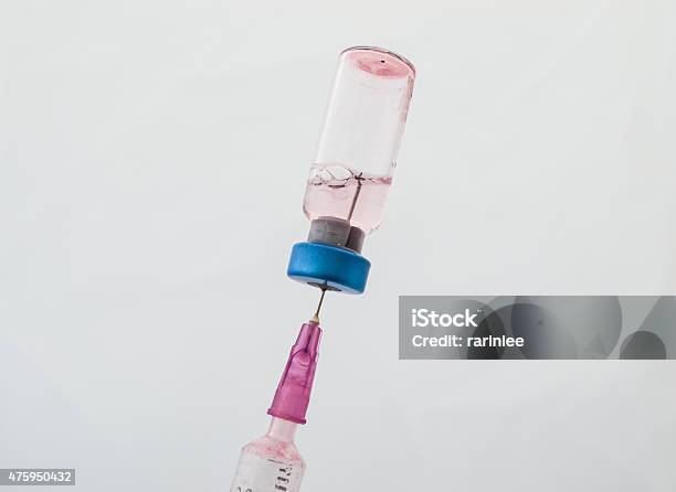 Vaccine Bottle With Syringe Stock Photo - Download Image Now - 2015, Cold And Flu, Dose