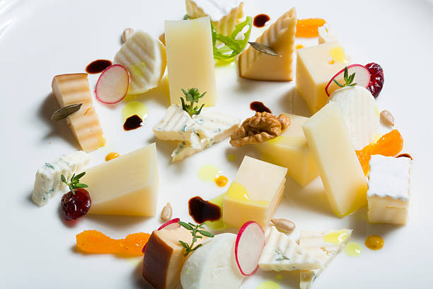 istock Assortment of cheeses with radish and nuts 475951082