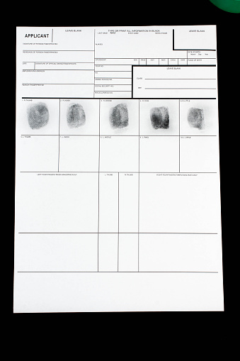Fingerprint on police fingerprint card.