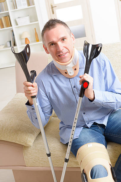 istock Man with leg in knee cages 475951746