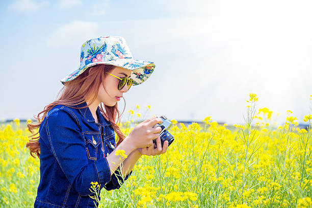 istock woman taking photos 475952892
