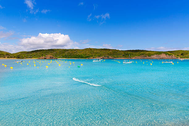 Menorca Es Grau clean port with llaut boats in Balearics Menorca Es Grau clean port with llaut boats in Balearic Islands balearics stock pictures, royalty-free photos & images