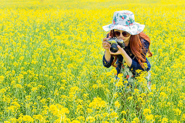 woman taking photos