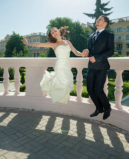 istock Real wedding: bride and groom at the funny summer day 475953240