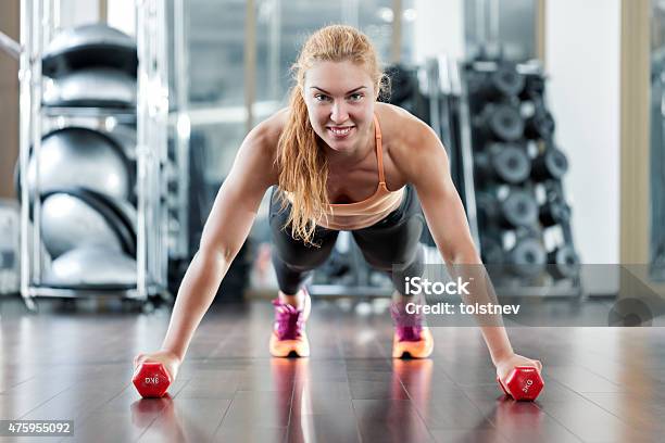 Woman Workouts In The Gym Stock Photo - Download Image Now - 2015, Active Lifestyle, Activity