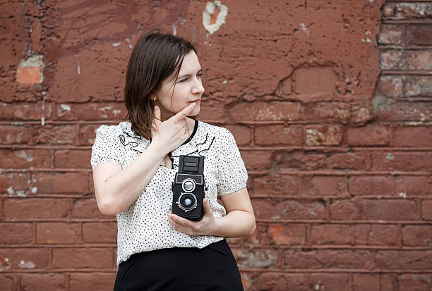 istock Woman photographer 475955106