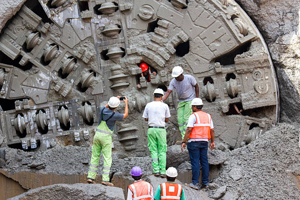 Unidentified workers are employed in construction overhead metro in bangalore stock photo