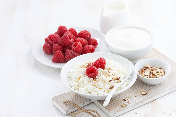 istock fresh homemade cottage cheese with raspberry, milk and yogurt 475959322