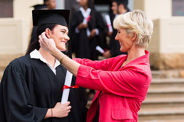 istock middle aged mother hugging her daughter 475961109
