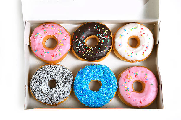 istock tempting box full of delicious donuts different flavors toppings 475966248