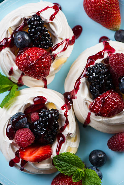 istock Homemade pavlova meringue with summer fresh berries 475970308