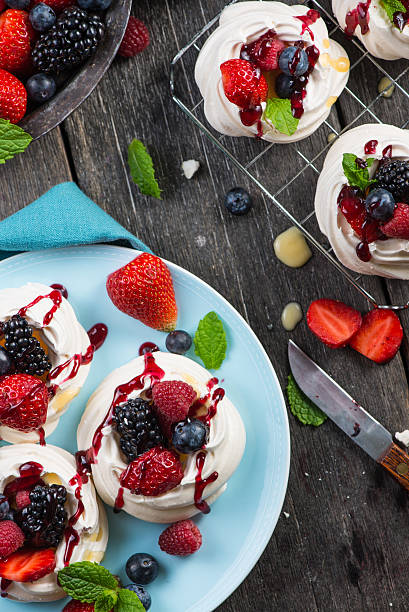 istock Homemade pavlova meringue with summer fresh berries 475970310