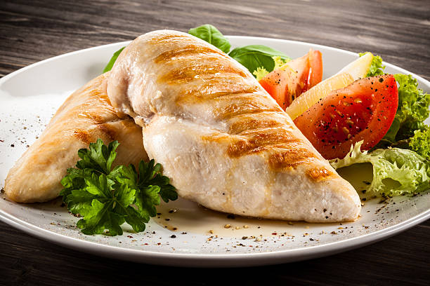 istock Roast chicken fillets and vegetables 475971434
