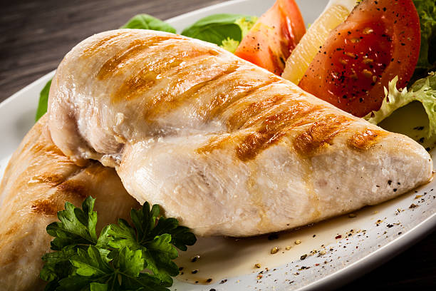 istock Roast chicken fillets and vegetables 475971444