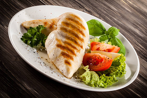 istock Roast chicken fillets and vegetables 475971446