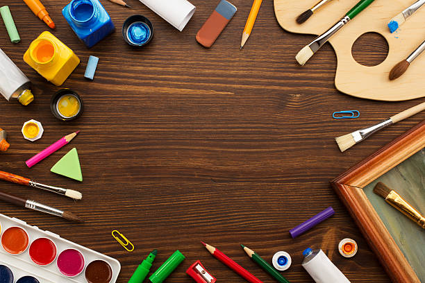 istock paint supplies and brush on wood 475976696