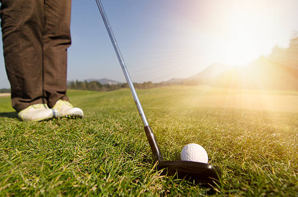 istock Golfer is chipping a golf ball onto the green 475979778