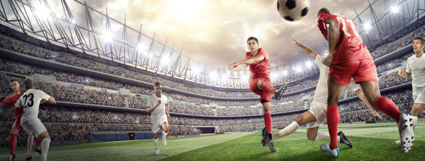 istock Soccer player kicking ball in stadium 475980484