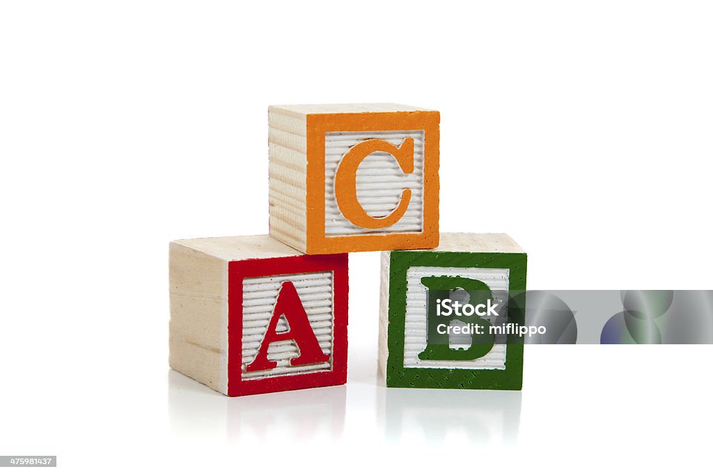 Colored Wooden Letter Blocks On A White Background Stock Photo - Download  Image Now - Alphabet, Block Shape, Capital Letter - iStock