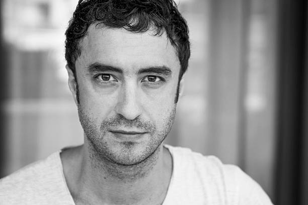 istock Attractive man looking serious at the camera 475981722
