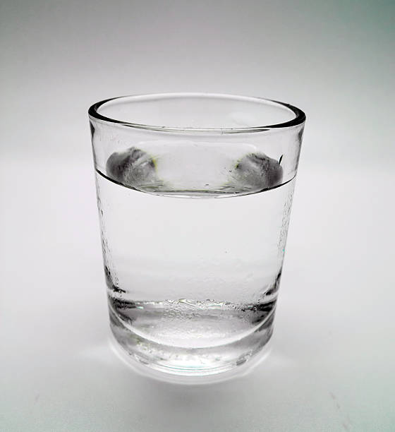 istock glass of water on isolated 475982150
