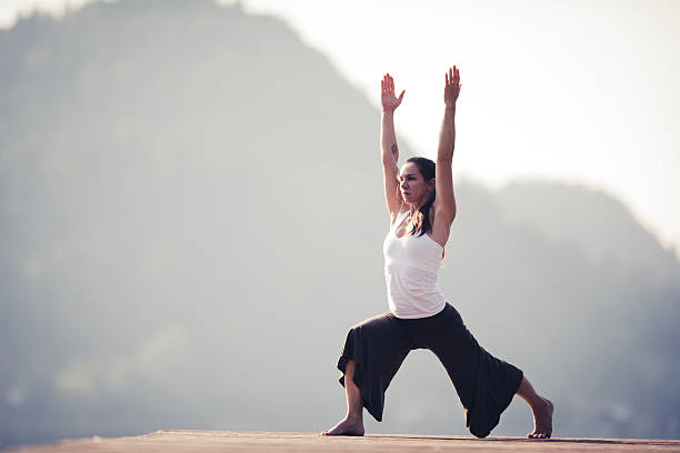 istock Yoga practicing outdoors 475983007