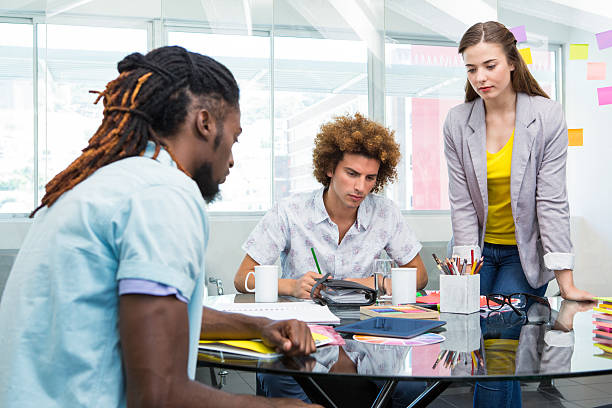 istock Creative business people working at desk 475987186