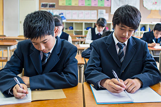 istock Japanese students writting the lesson 475987202