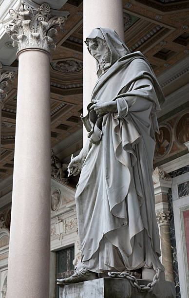 istock Rome - st. John the Evangelist statue 475988131