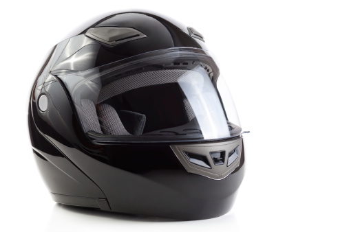 Negro, brillante casco de motociclismo photo
