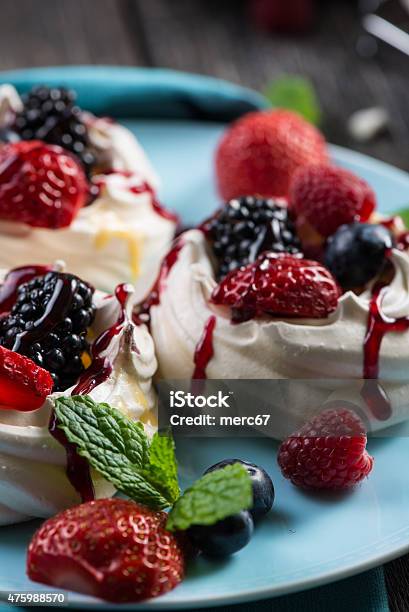 Homemade Pavlova Meringue With Fresh Berries Stock Photo - Download Image Now - 2015, Baked, Baked Pastry Item