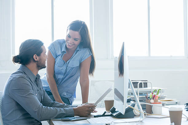 istock Business colleagues going over a report together. 475988902