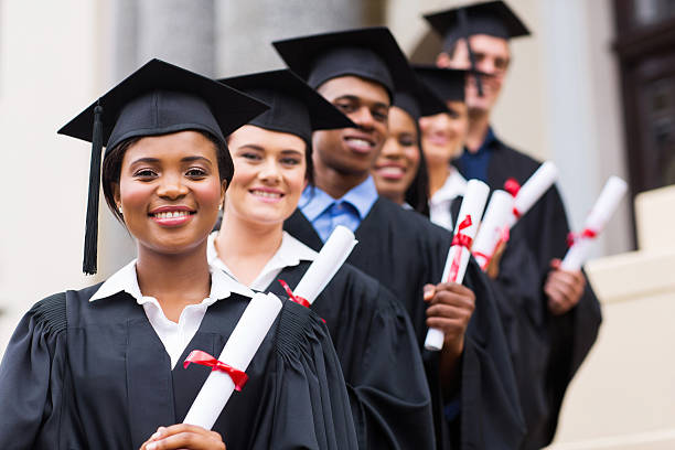 istock group of university graduates at graduation 475989193