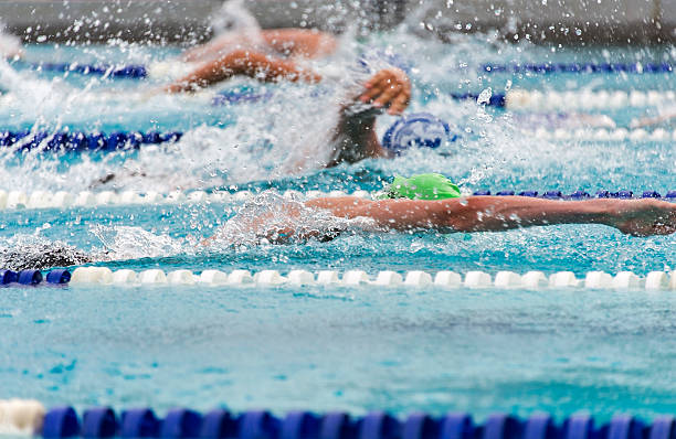 istock Freestyle swimmers in a close race 475990049